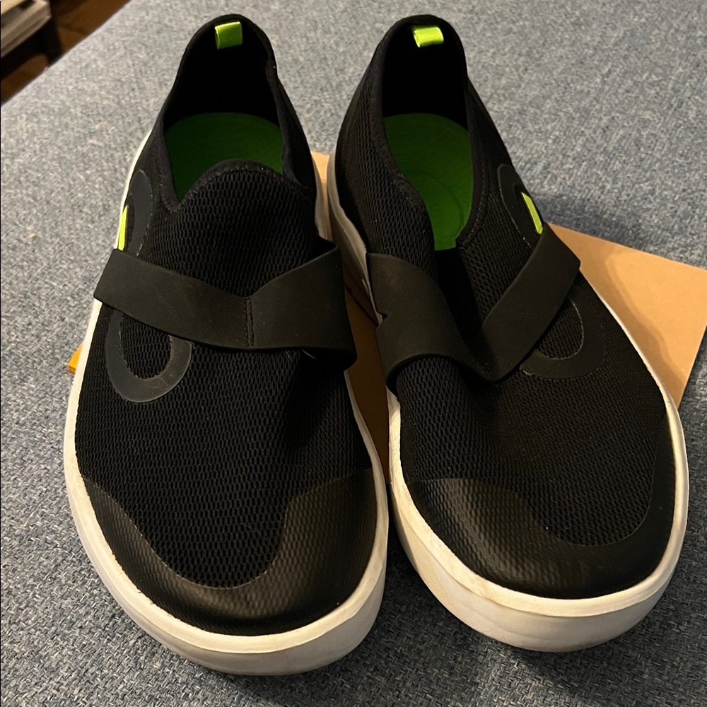 OOFOS Black and White Slip-On Shoes